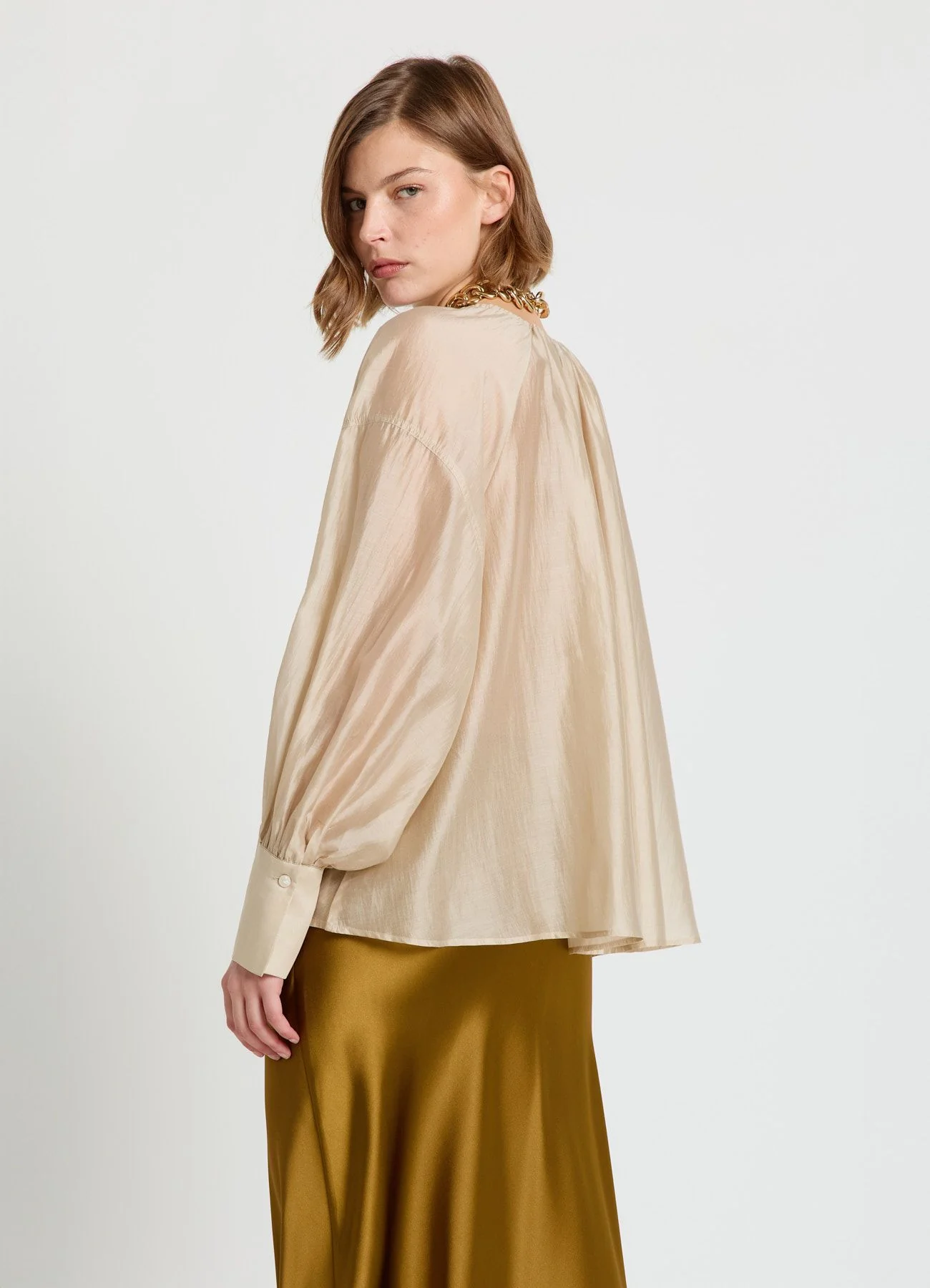 Blusa ampia tinta unita