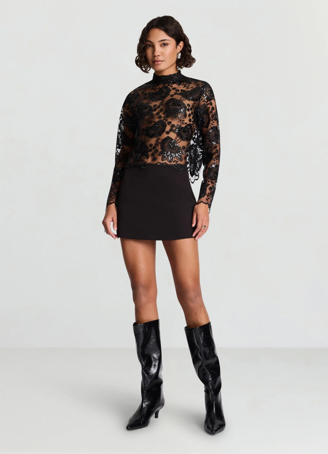 Blusa in pizzo con paillettes