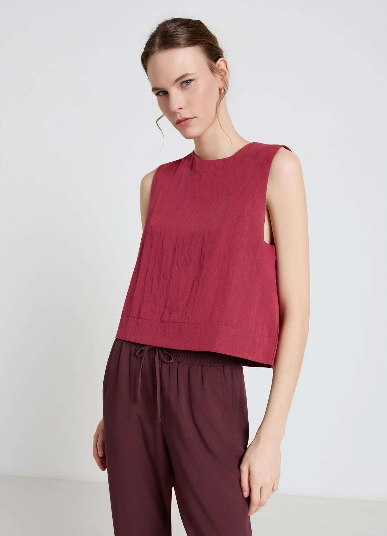Blusa smanicata a tinta unita - Image 2