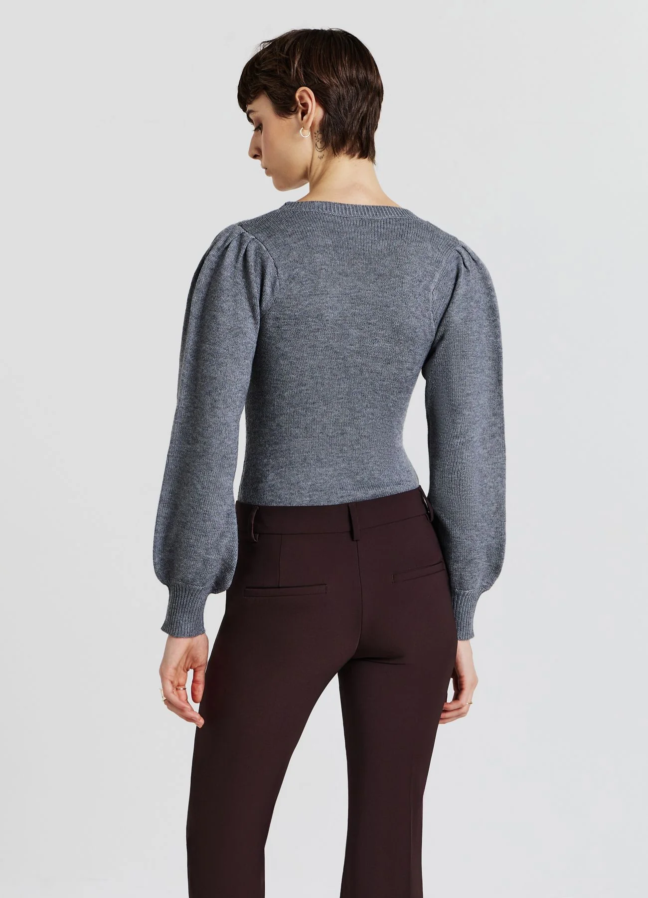 Body in maglia con trecce