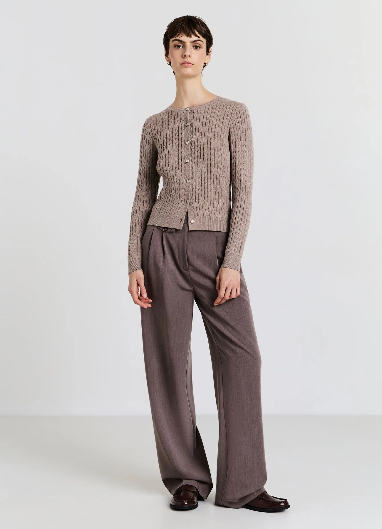 Cardigan con trecce