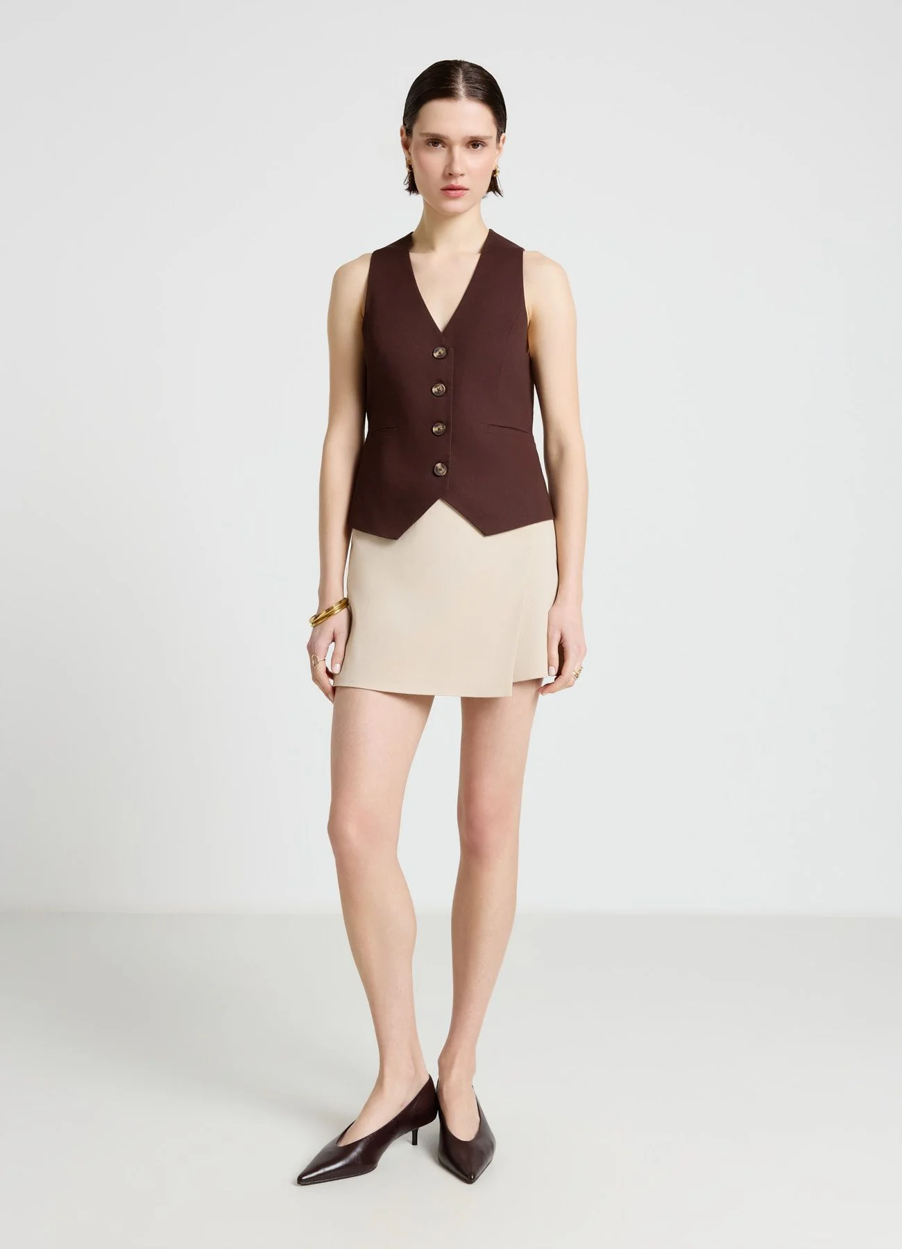 Gilet con scollo a v e bottoni