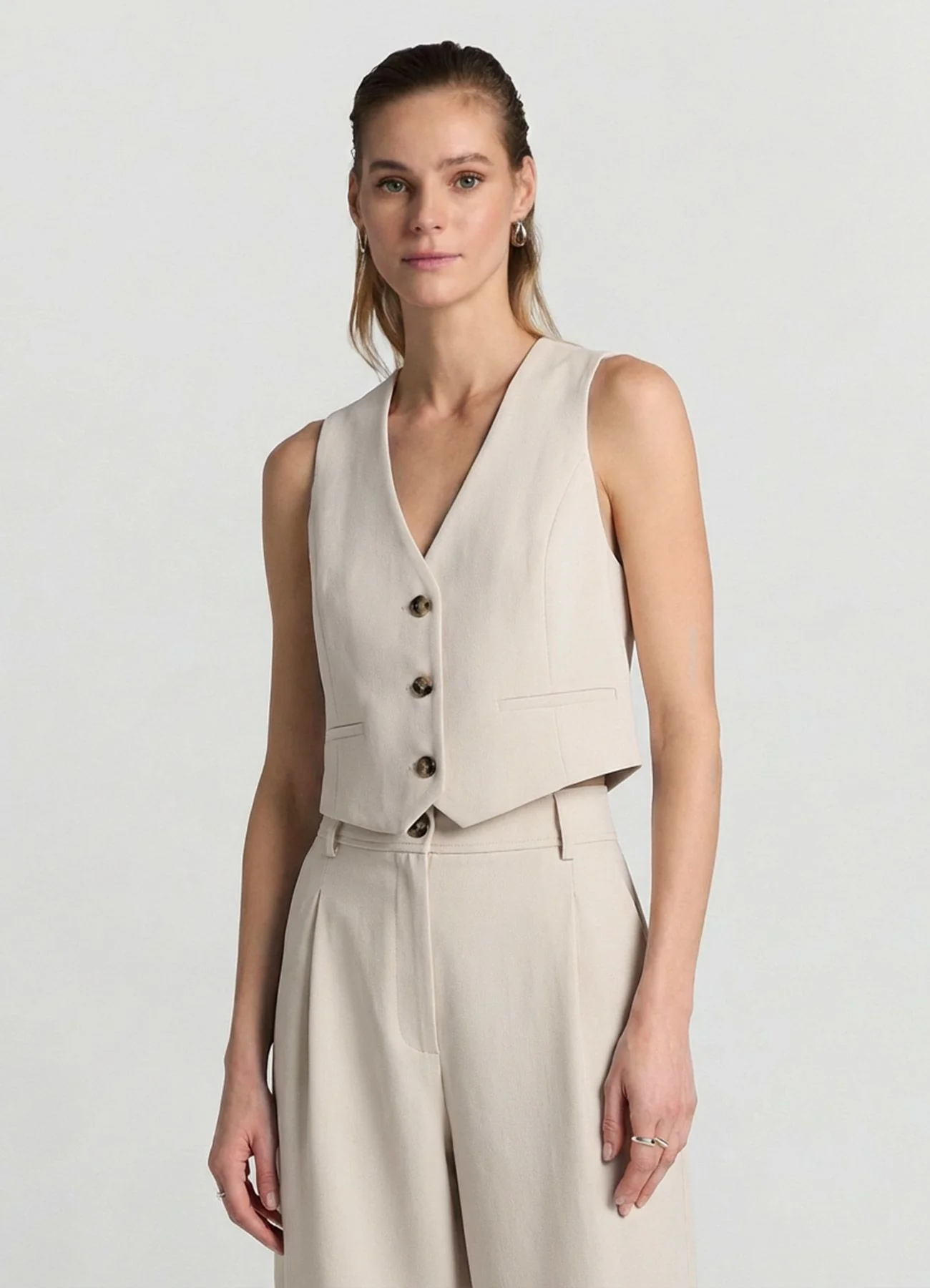 Gilet corto con bottoni