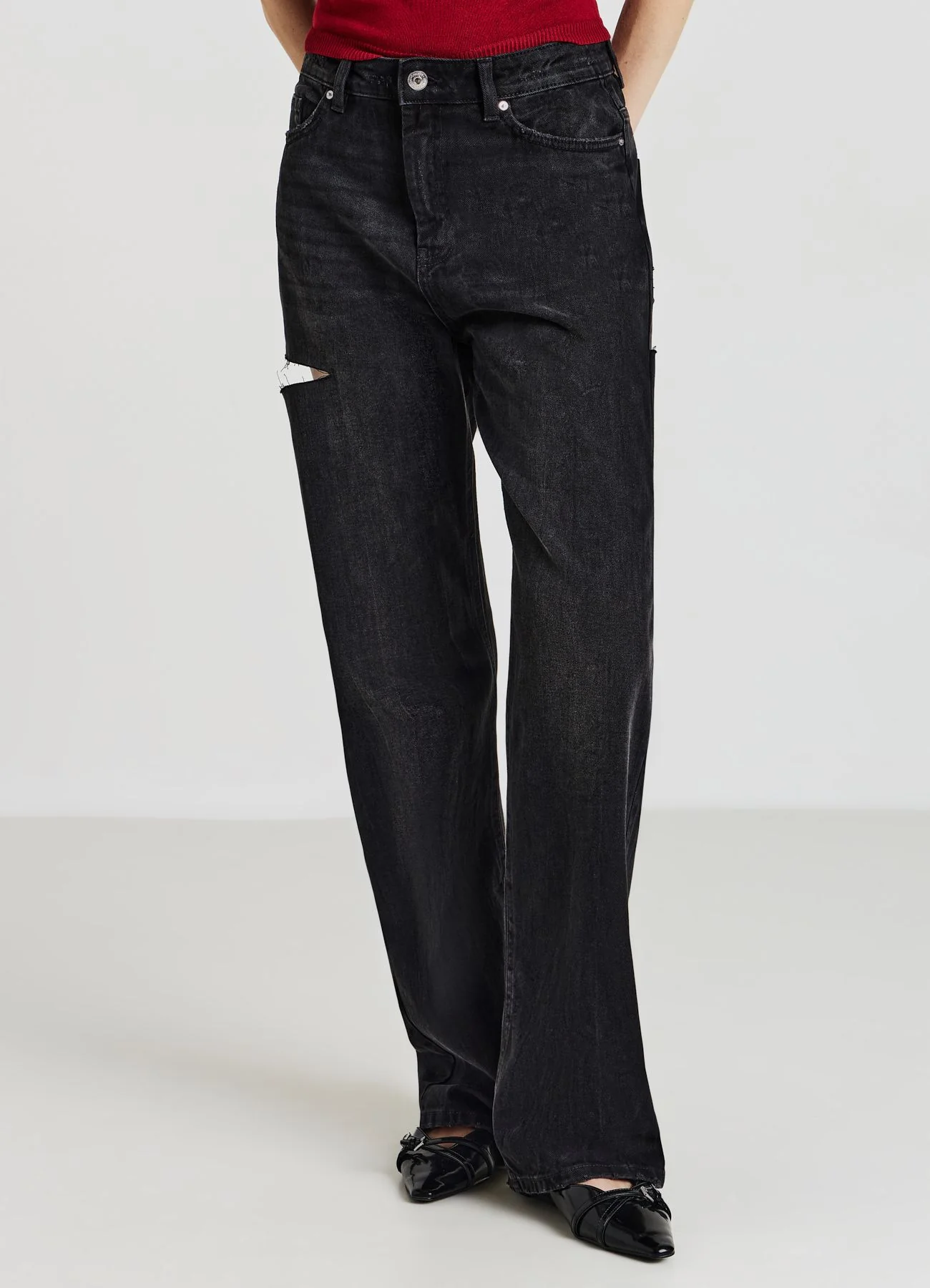 Jeans con strappi - Image 2