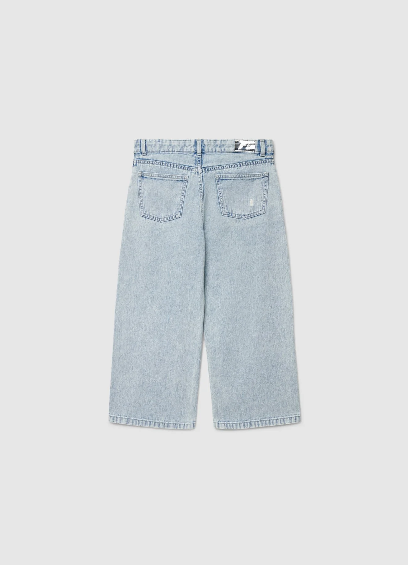 Jeans crop con patch luccicanti