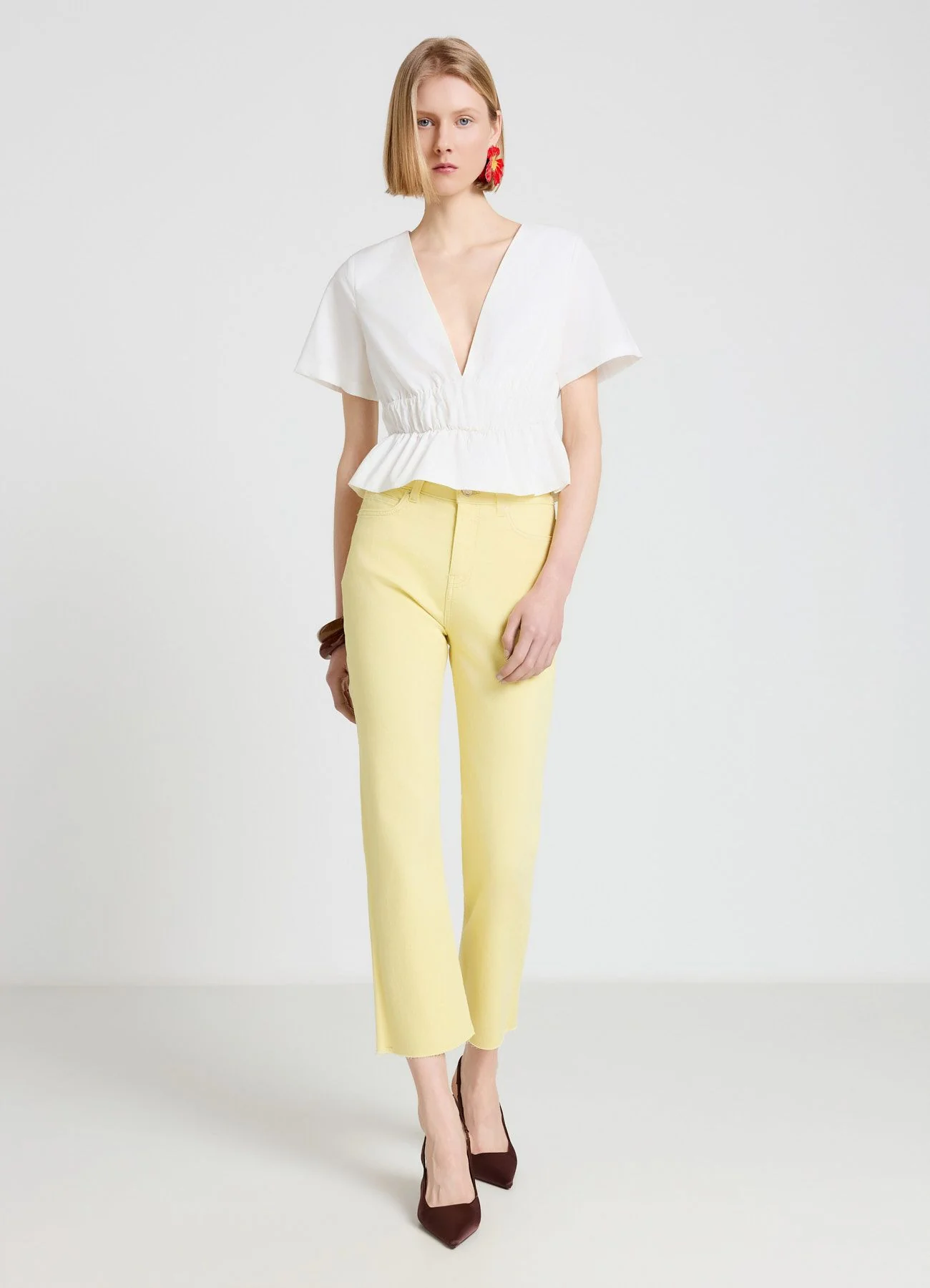 Jeans cropped flare a tinta unita