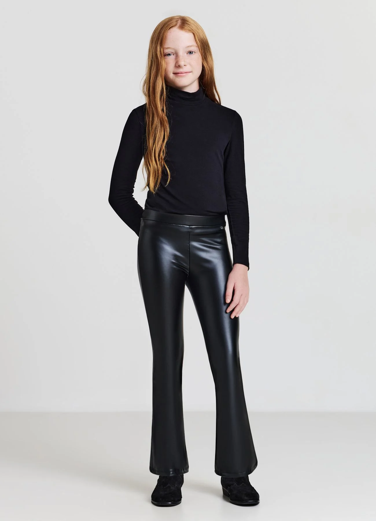Leggings a zampa effetto pelle