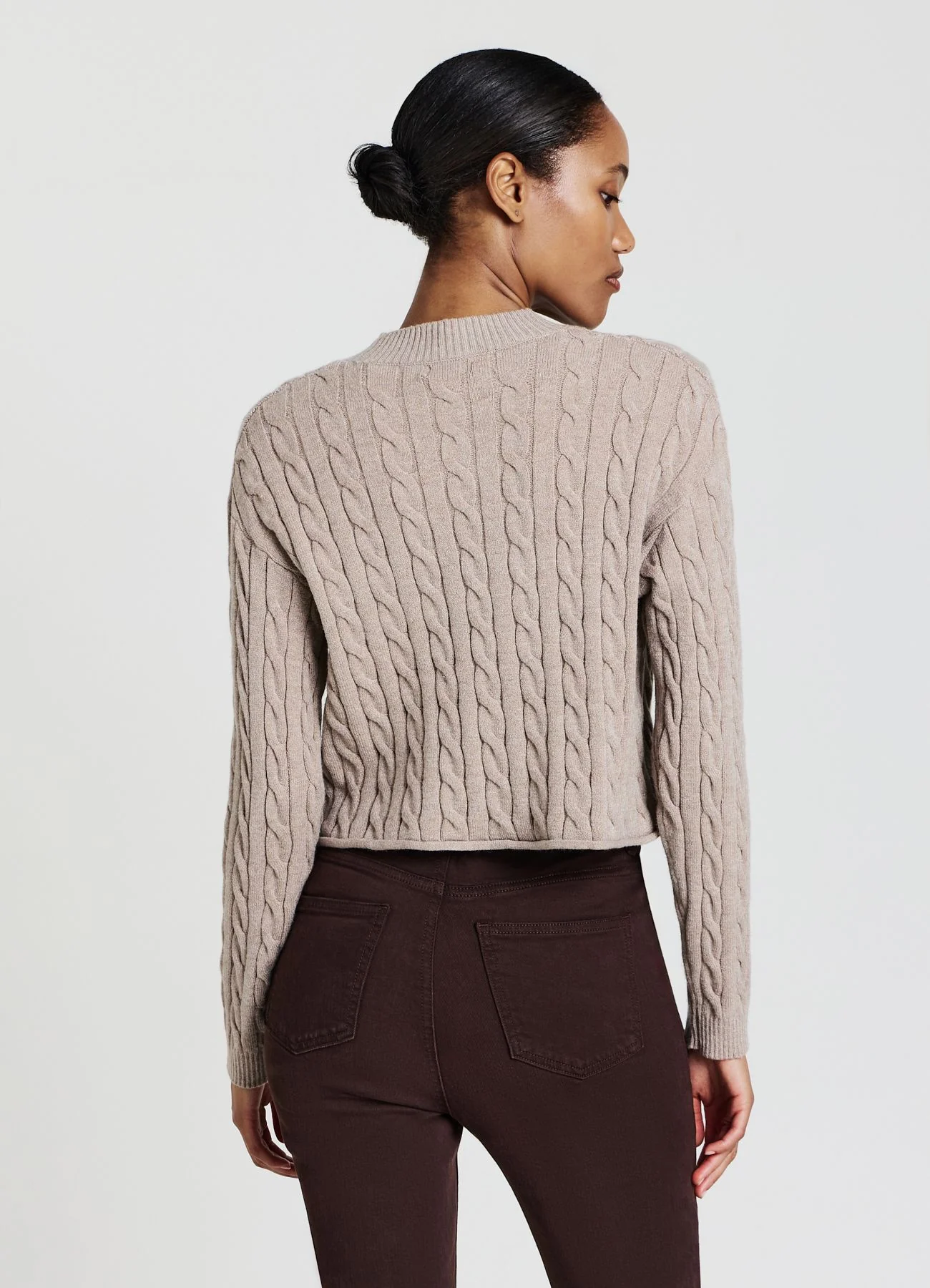 Maglia crop con trecce