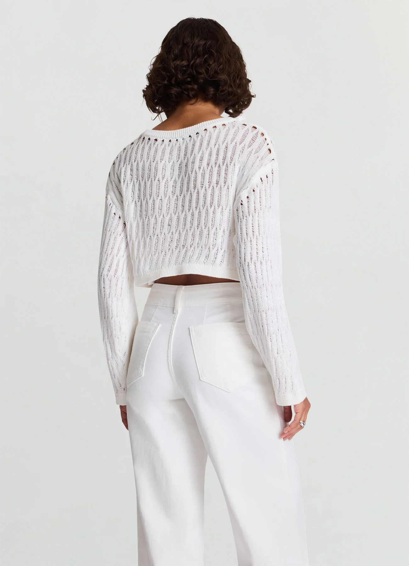 Maglia crop traforata a girocollo