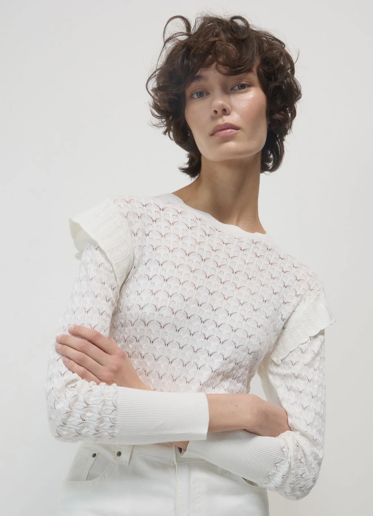 Maglia traforata con volants