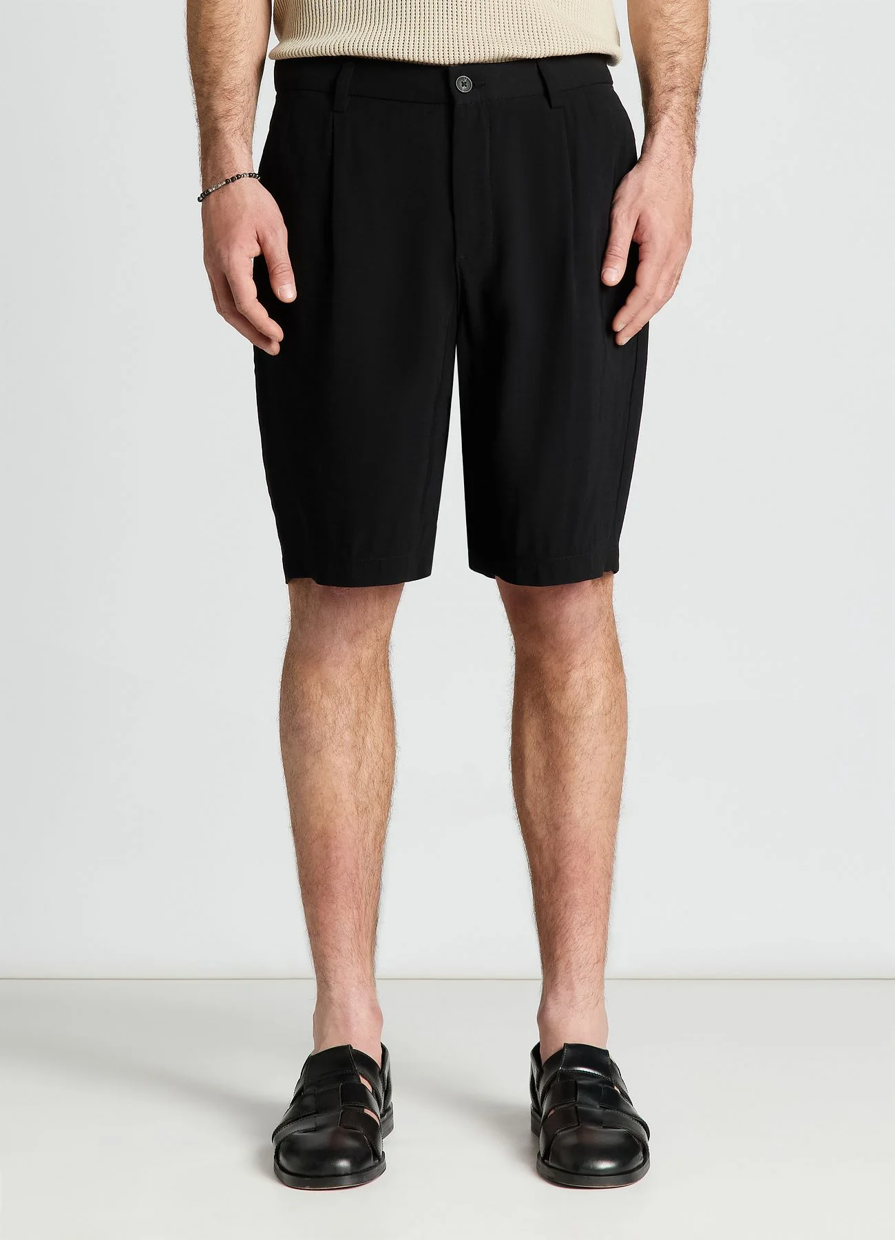 Pantaloncini bermuda con pieghe