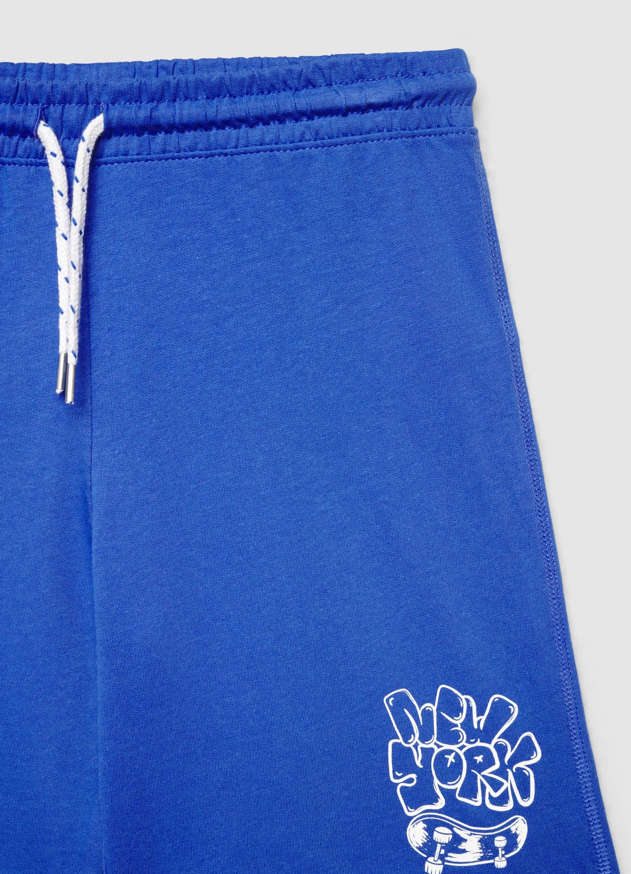 Pantaloncini ginnici over con coulisse e stampa