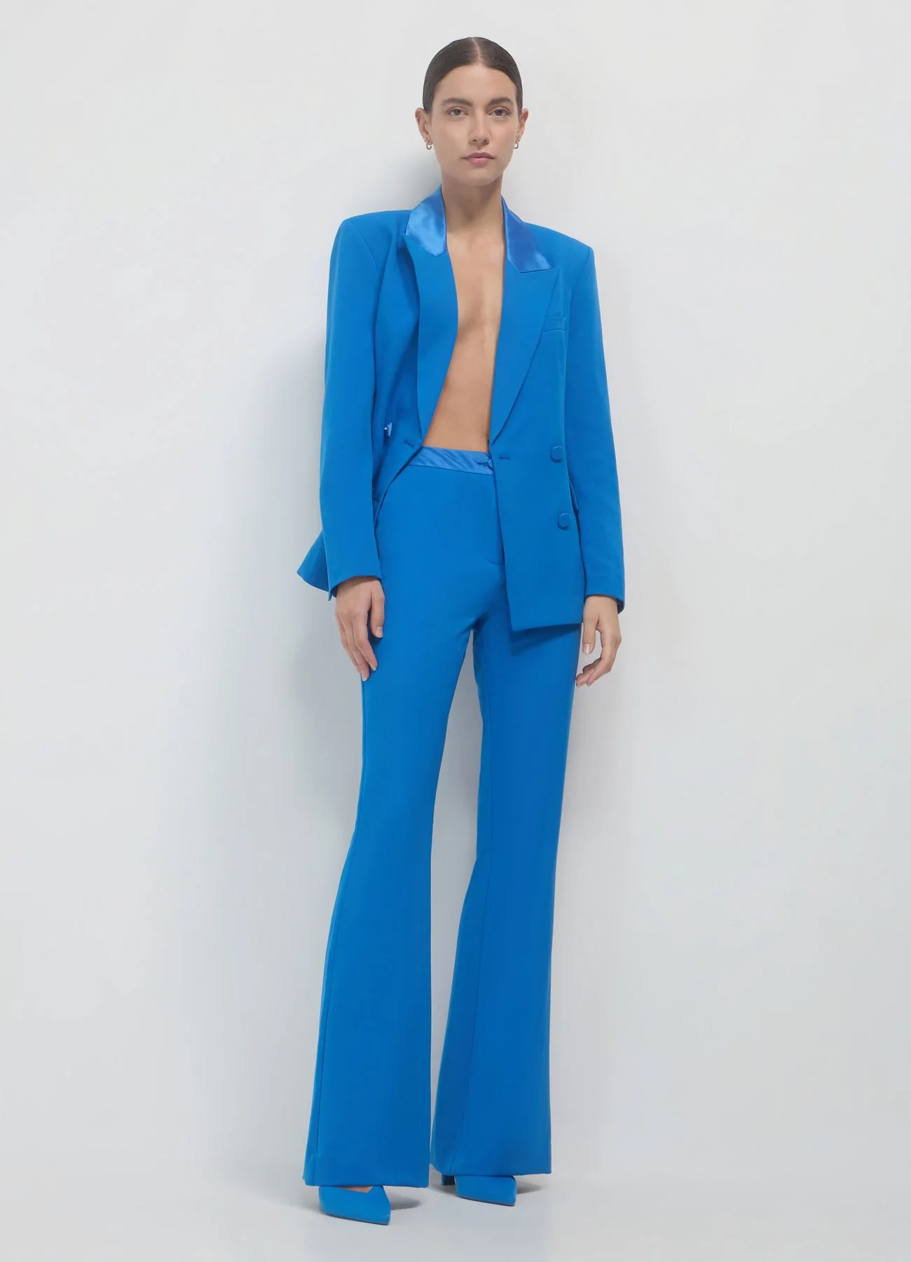 Pantalone zampa fascia simil satin