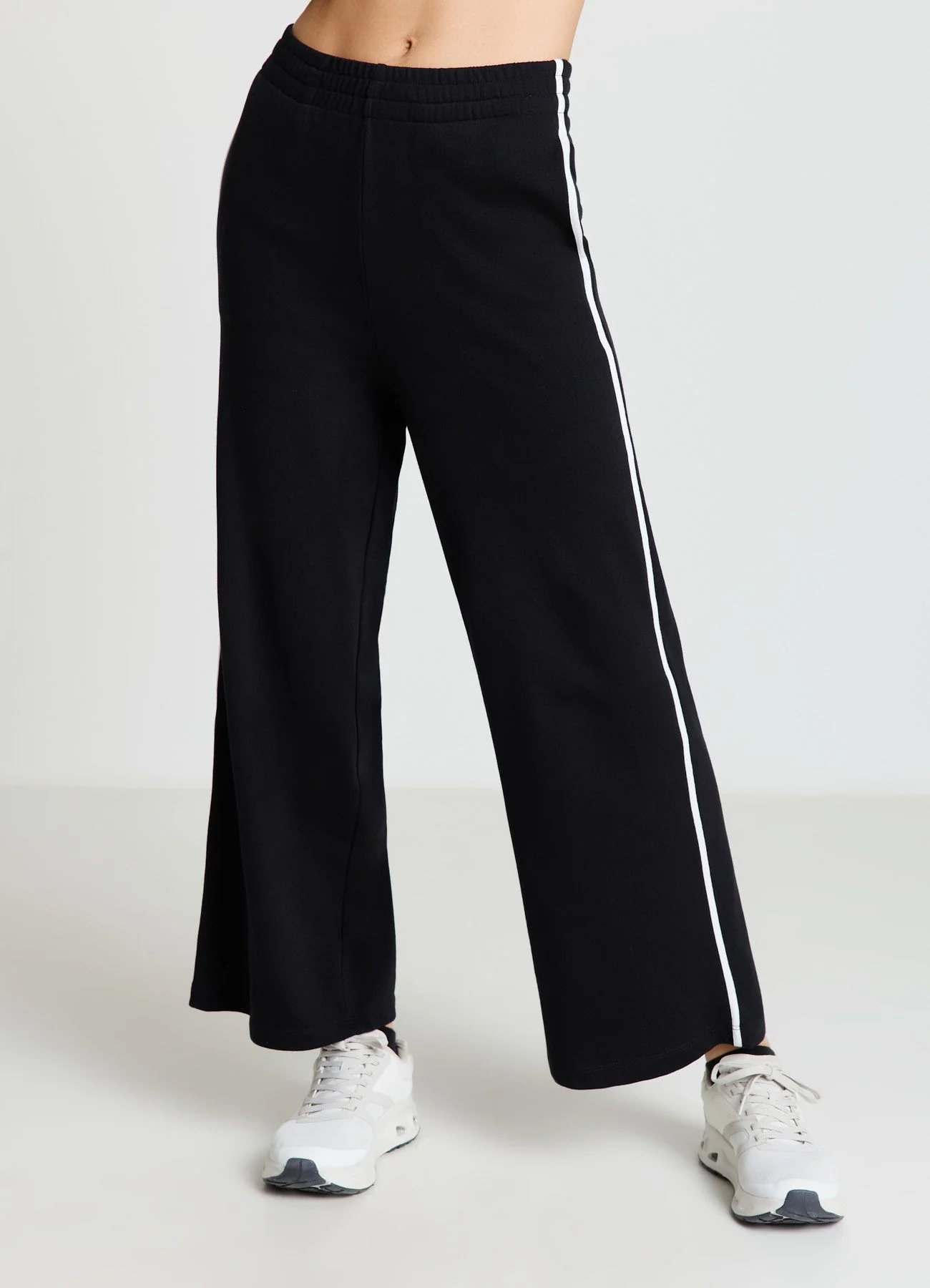 Pantaloni ginnici wide leg con bande laterali