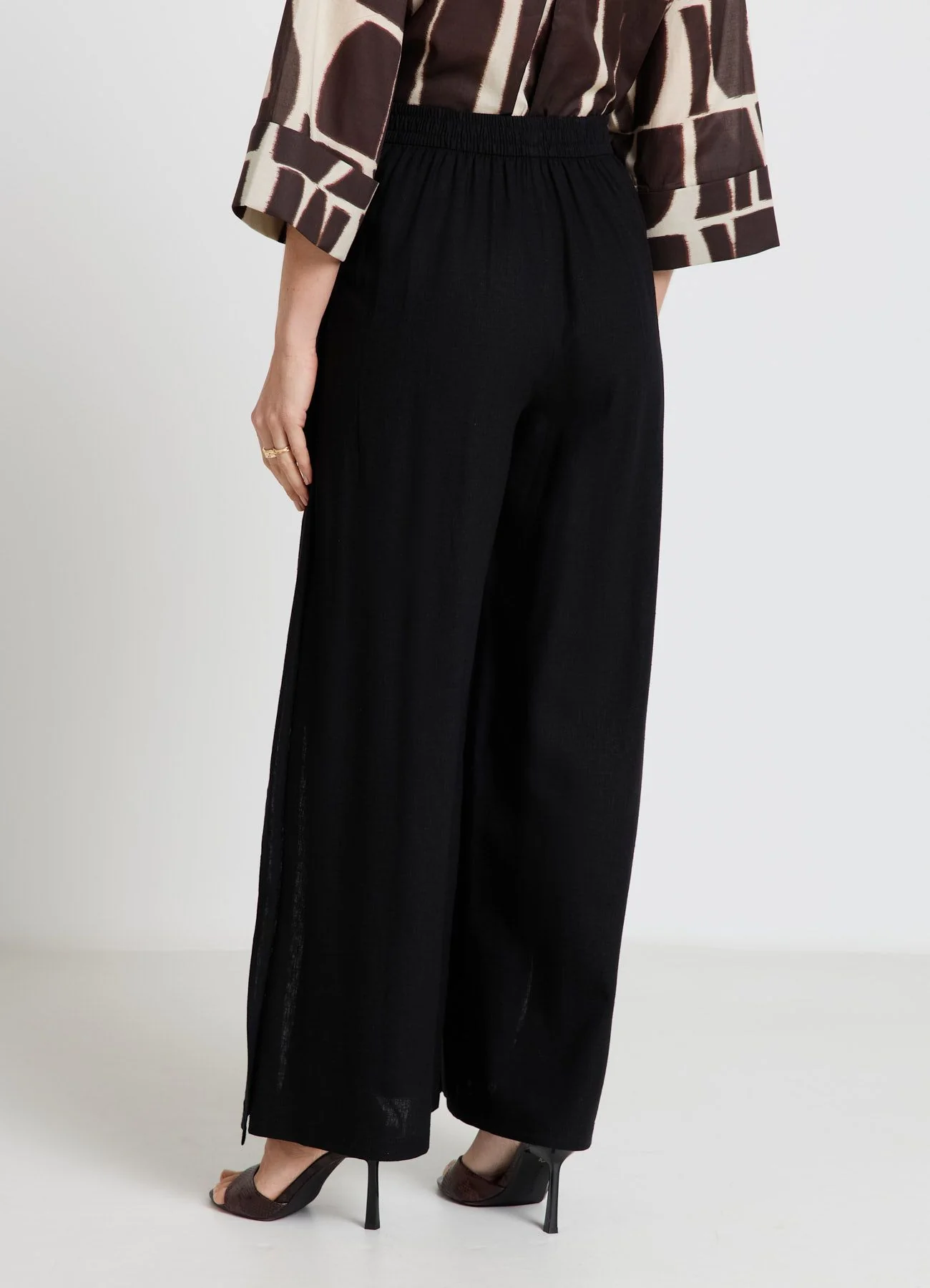 Pantaloni palazzo con cintura annodata