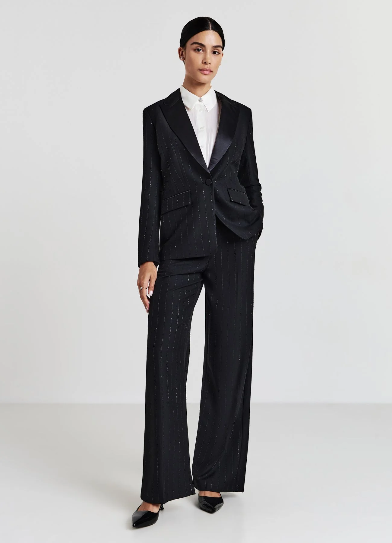 Pantaloni palazzo con paillettes