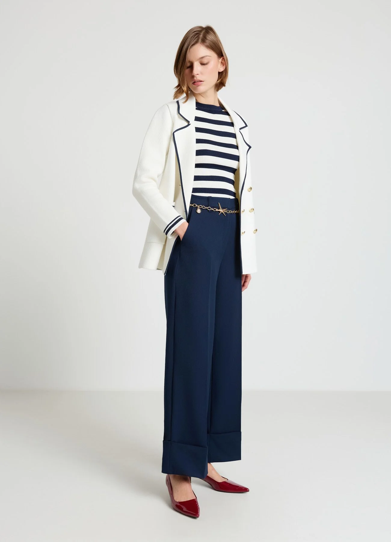 Pantaloni palazzo con risvolto