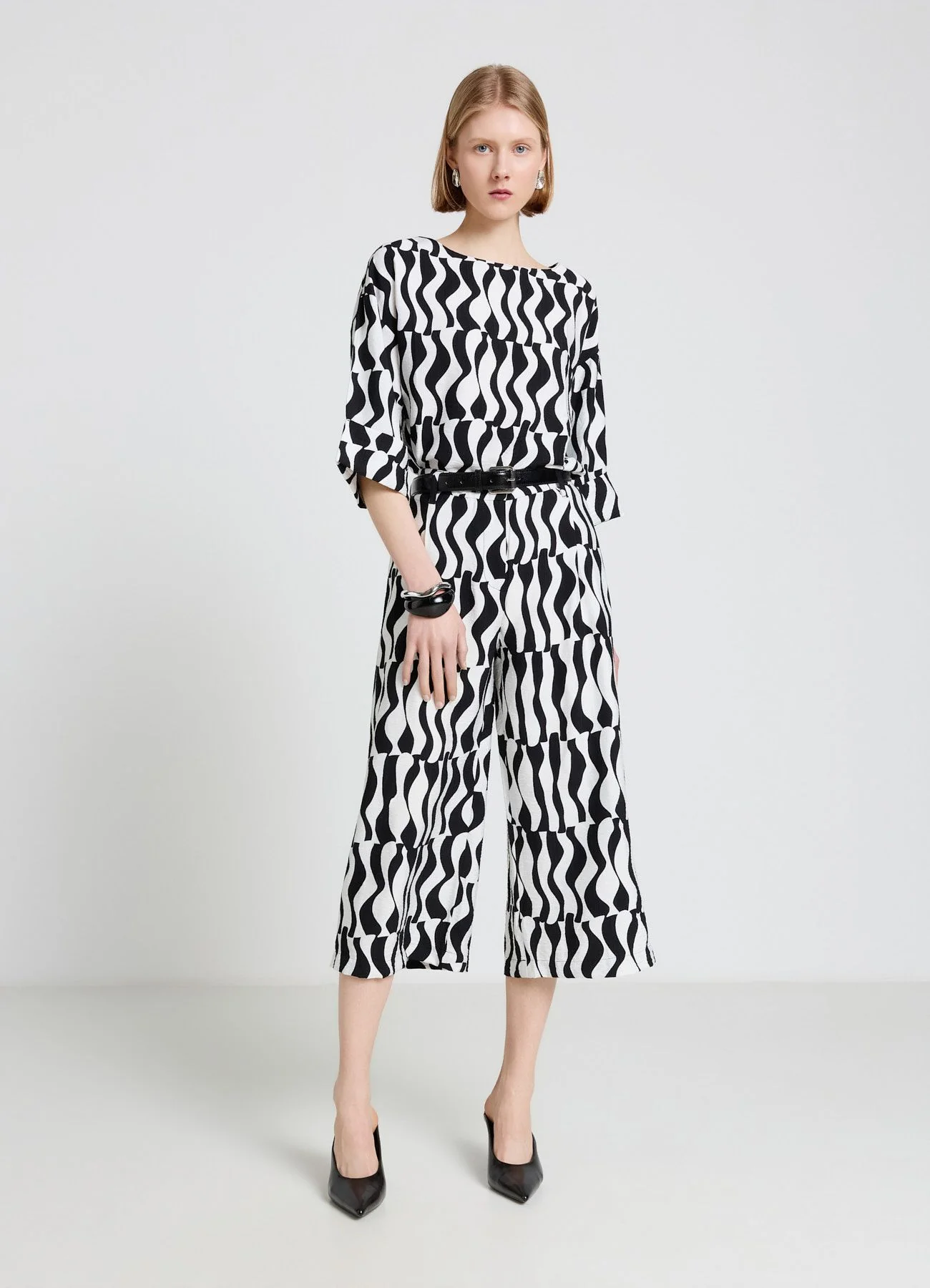 Pantaloni palazzo crop ampio a fantasia