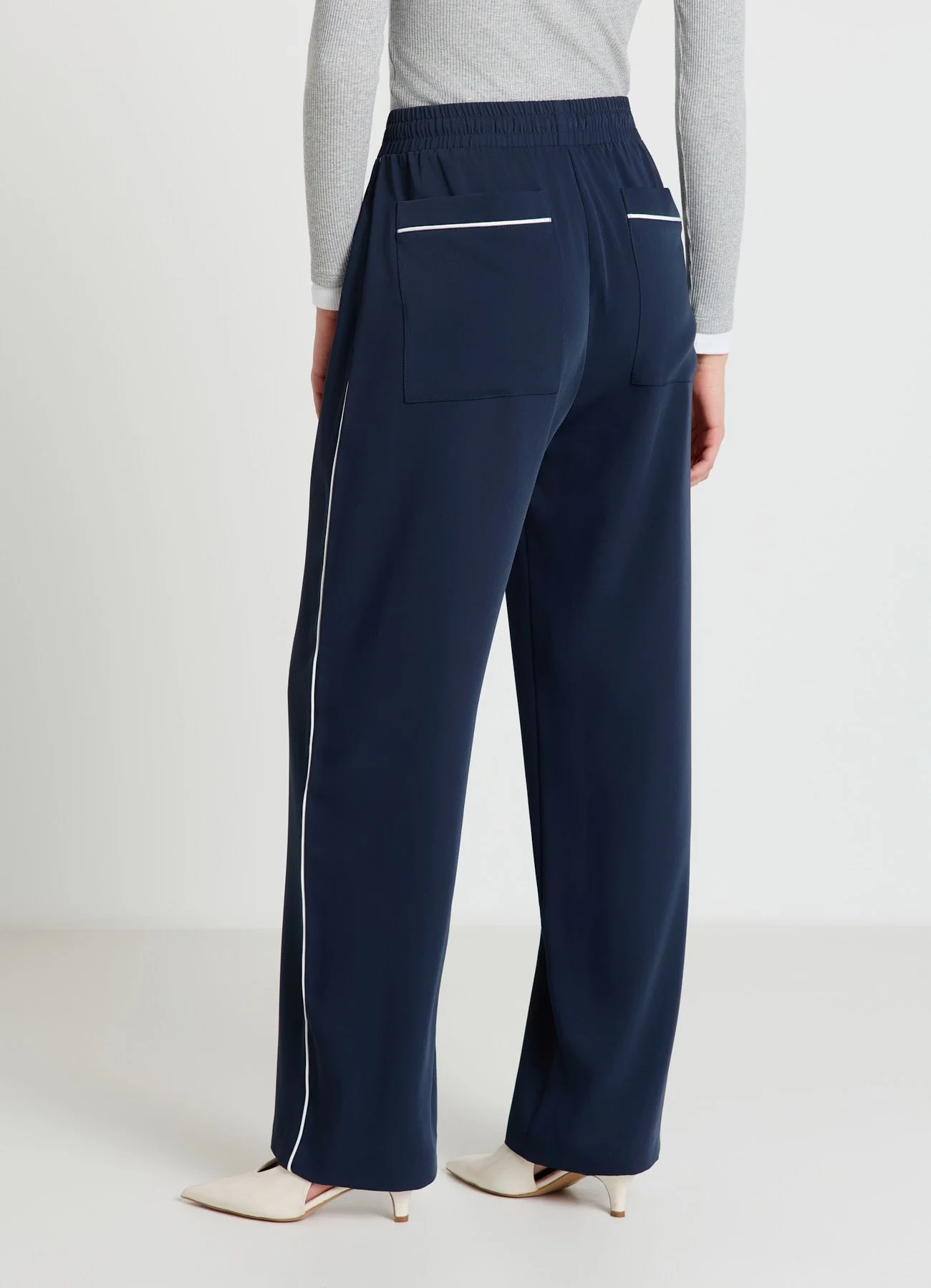 Pantaloni profili a contrasto