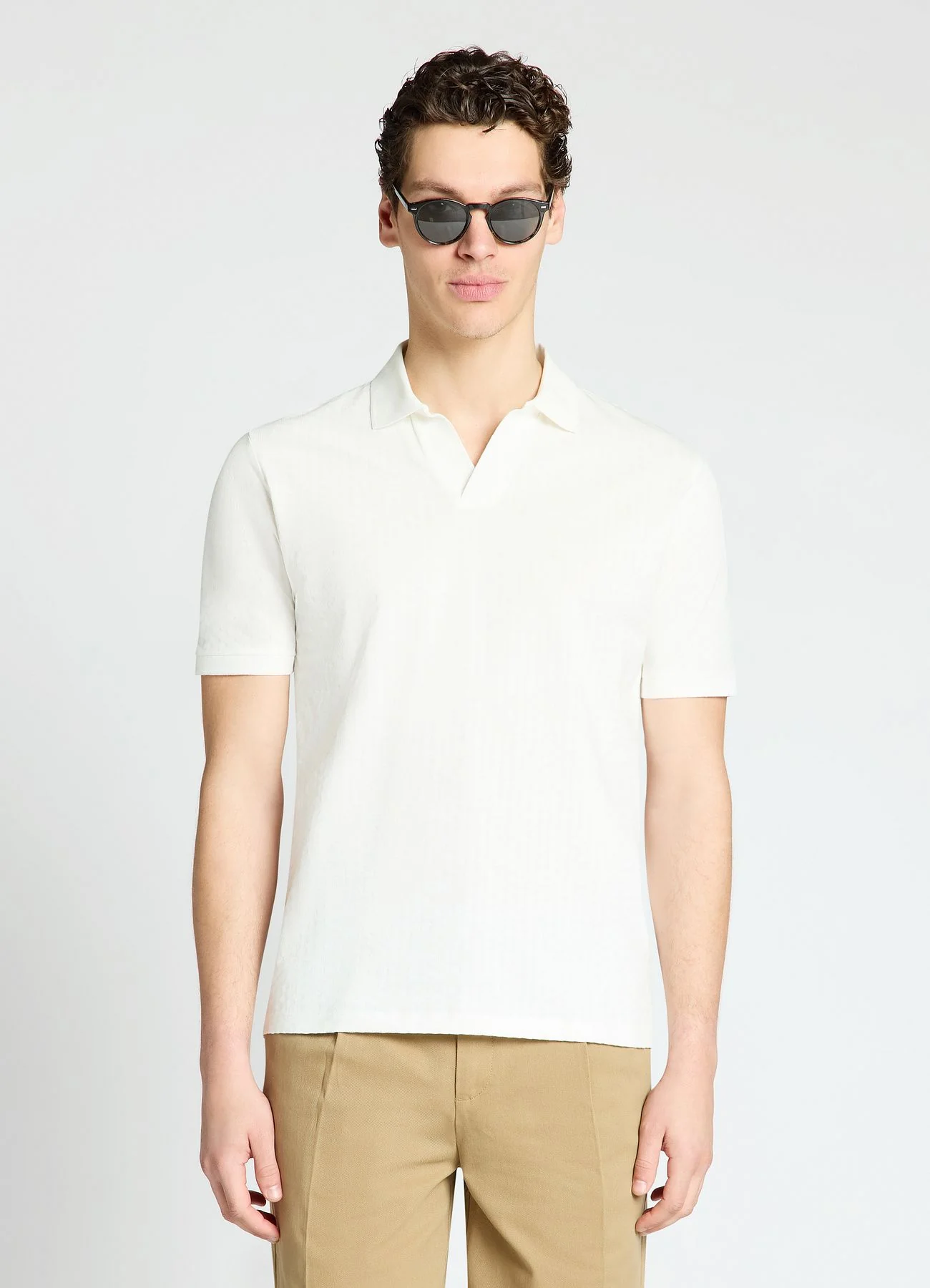 Polo con collo aperto in jacquard