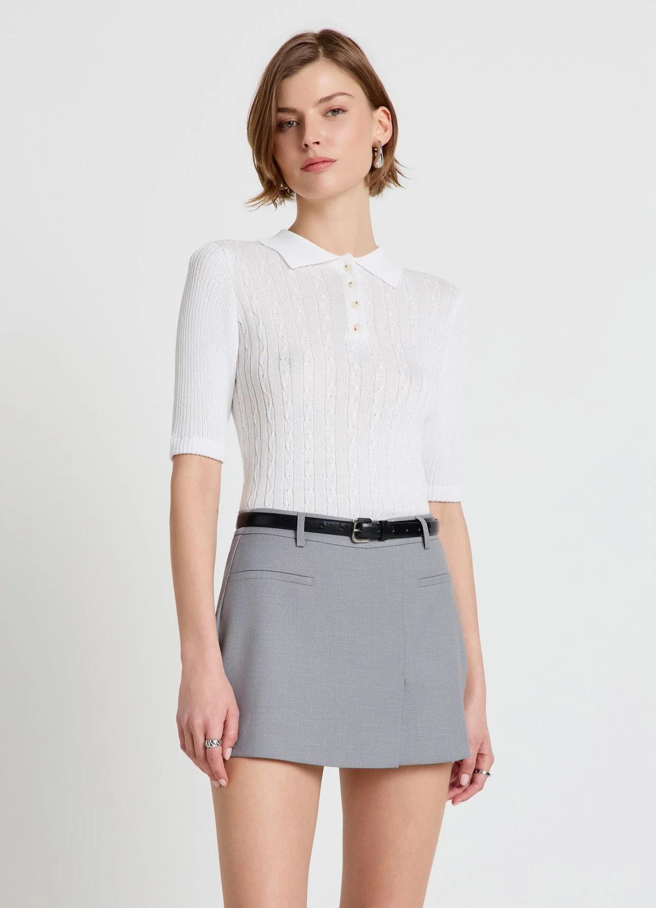 T-shirt polo con trecce