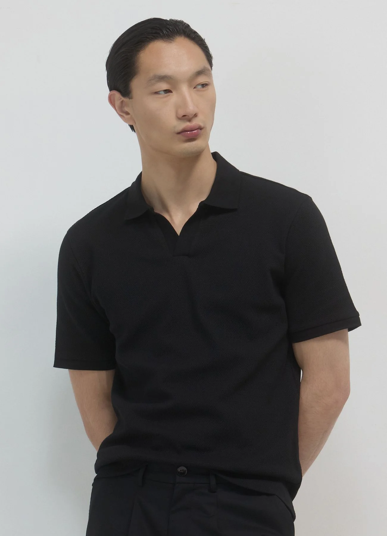 T-shirt polo tessuto operato