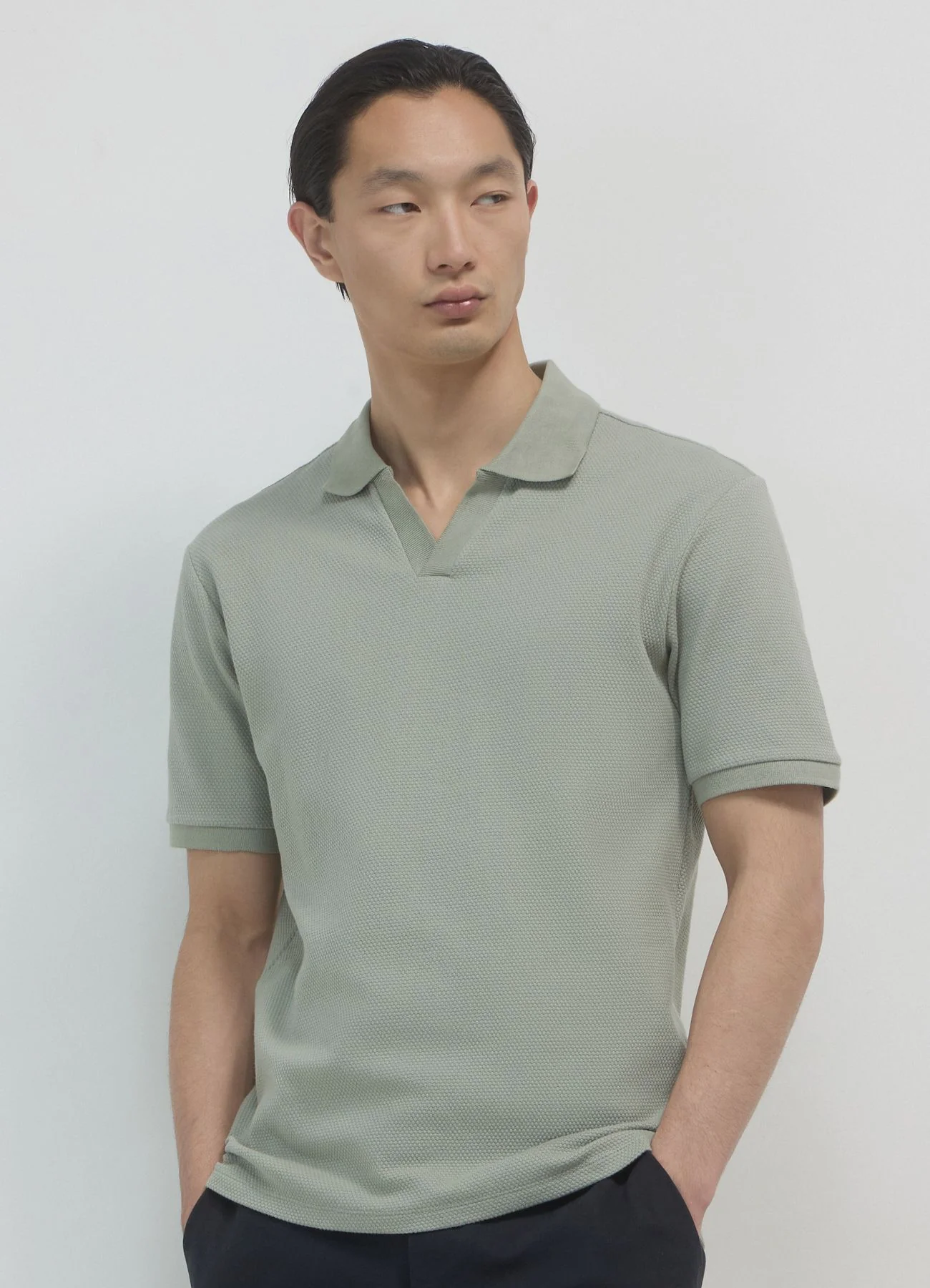 T-shirt polo tessuto operato
