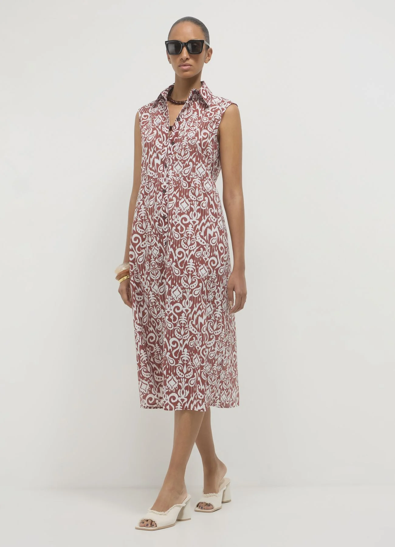 Vestito smanicato fantasia bicolor